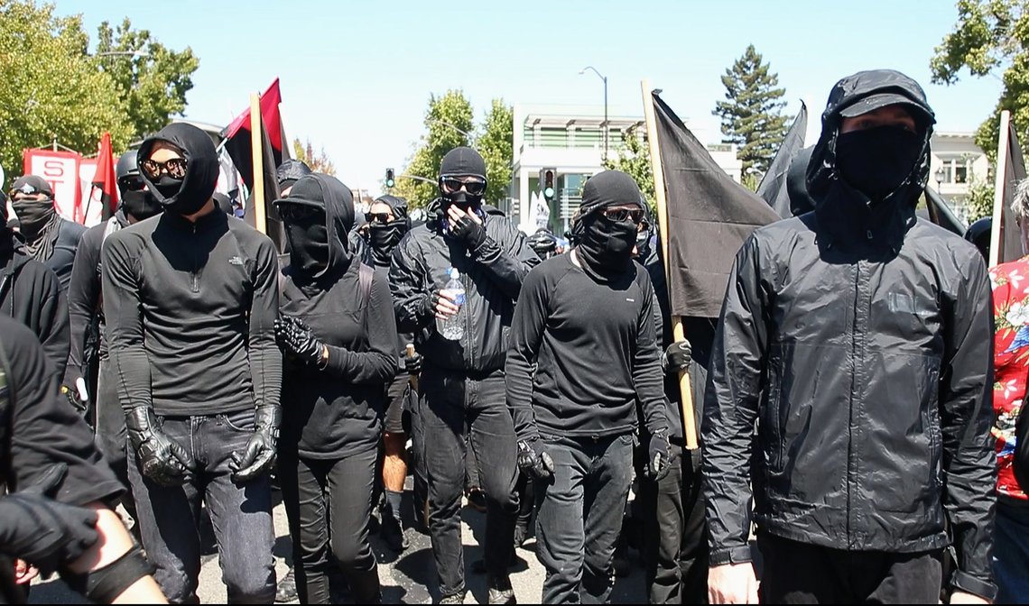 Black-clad Antifa marchers arrive at Civic Center Park, Sunday, Aug. 27, 2017, in a counter-protest against a planned alt-right rally in Berkeley, California. (Karl Mondon/Bay Area News Group) Black-clad Antifa marchers arrive at Civic Center Park, Sunday, Aug. 27, 2017, in a counter-protest against a planned alt-right rally in Berkeley, California. (Karl Mondon/Bay Area News Group)