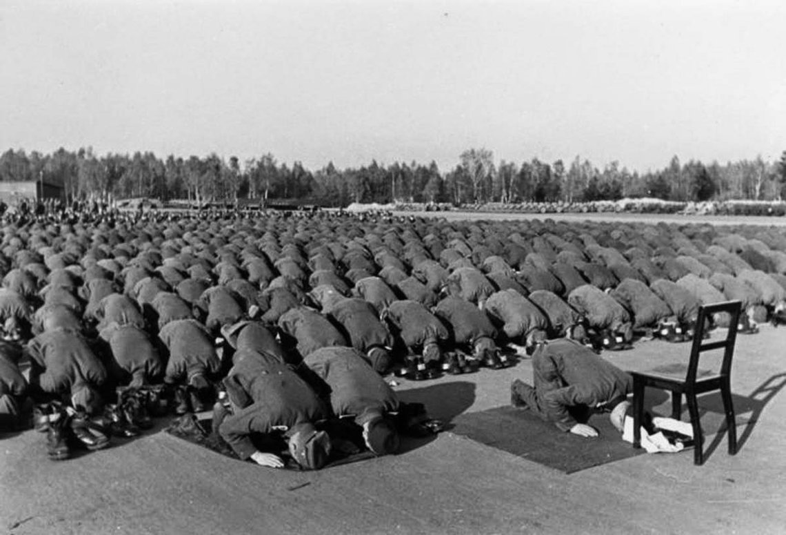 Muslim members of the Waffen-SS 13th division at prayer during their training in Germany, 1943 Muslim members of the Waffen-SS 13th division at prayer during their training in Germany, 1943