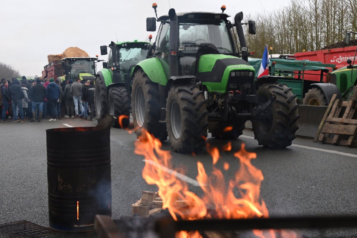 Farmers block a highway during a demonstration Tuesday, Jan. 23, 2024 near Beauvais, northern France. Farmers have for months been protesting for better pay and against what they consider to be excessive regulation, mounting costs and other problems. (AP Photo/Matthieu Mirville) Farmers block a highway during a demonstration Tuesday, Jan. 23, 2024 near Beauvais, northern France. Farmers have for months been protesting for better pay and against what they consider to be excessive regulation, mounting costs and other problems. (AP Photo/Matthieu Mirville)