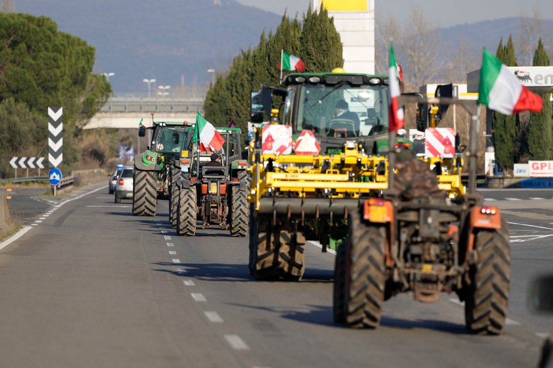 Farmers line up with their tractors on the high speed road in Orte, Italy, Wednesday, Jan. 31, 2024. Farmers have been protesting in various parts of Italy and Europe against EU agriculture policies. (AP Photo/Andrew Medichini) Farmers line up with their tractors on the high speed road in Orte, Italy, Wednesday, Jan. 31, 2024. Farmers have been protesting in various parts of Italy and Europe against EU agriculture policies. (AP Photo/Andrew Medichini)