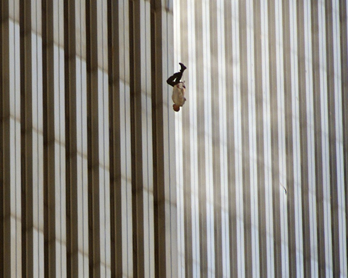 ** FOR USE AS DESIRED WITH SEPT. 11 ANNIVERSARY STORIES--FILE **A person falls from the north tower of New York's World Trade Center in this Sept. 11, 2001, file photo, after terrorists crashed two hijacked airliners into the World Trade Center and brought down the twin 110-story towers. This year will mark the fifth anniversary of the attacks. (AP Photo/Richard Drew/FILE) ** FOR USE AS DESIRED WITH SEPT. 11 ANNIVERSARY STORIES--FILE **A person falls from the north tower of New York's World Trade Center in this Sept. 11, 2001, file photo, after terrorists crashed two hijacked airliners into the World Trade Center and brought down the twin 110-story towers. This year will mark the fifth anniversary of the attacks. (AP Photo/Richard Drew/FILE)