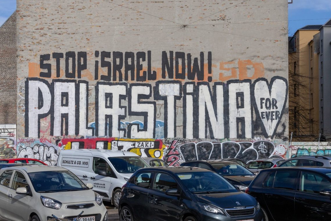 Copenhagen, Denmark Feb 22, 2023 A stop Israel sign painted on the facade of a building in the Norrebro district. Photo: Shutterstock by Alexanderstock23, Sweden. Copenhagen, Denmark Feb 22, 2023 A stop Israel sign painted on the facade of a building in the Norrebro district. Photo: Shutterstock by Alexanderstock23, Sweden.