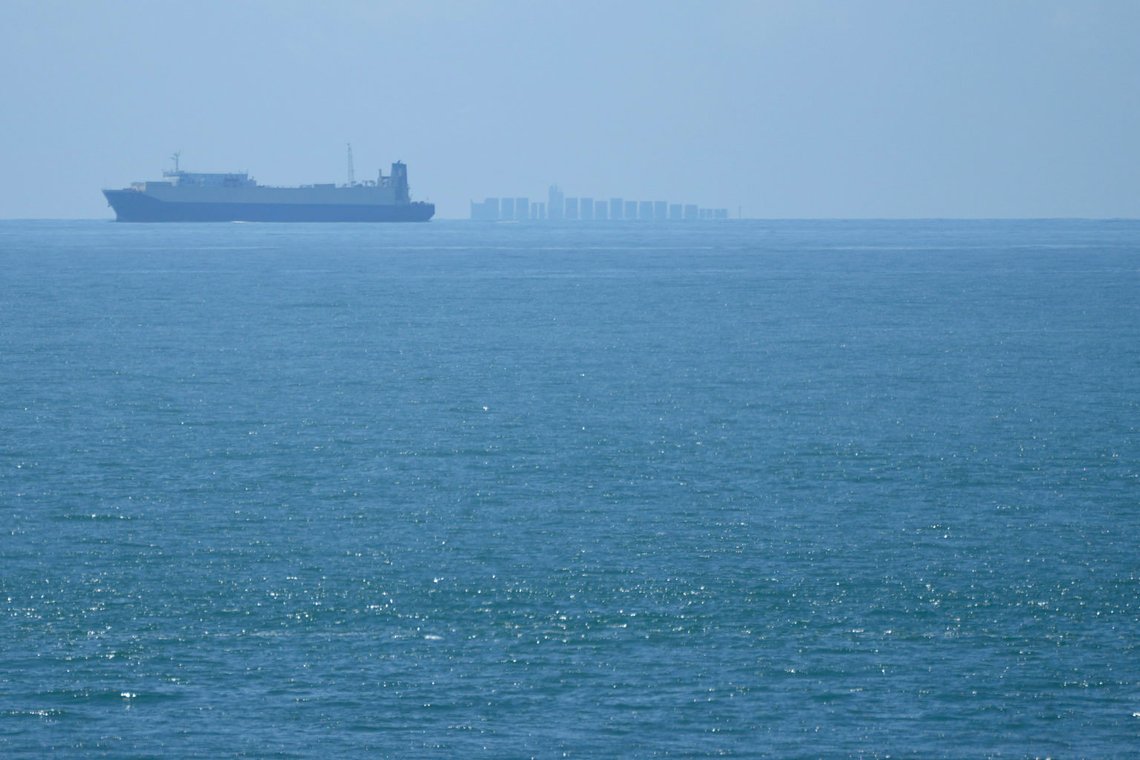 FILE - Ships move through the Taiwan Strait as seen from the 68-nautical-mile scenic spot, the closest point in mainland China to the island of Taiwan, in Pingtan in southeastern China's Fujian Province, on Aug. 5, 2022. Warning of a new wave of panic, Taiwan on Tuesday, Feb. 20, 2024, protested antagonist China’s boarding of a tourist boat as tensions rise around the Kinmen archipelago that lies just off the Chinese coast but is controlled by Taiwan. (AP Photo/Ng Han Guan, File) FILE - Ships move through the Taiwan Strait as seen from the 68-nautical-mile scenic spot, the closest point in mainland China to the island of Taiwan, in Pingtan in southeastern China's Fujian Province, on Aug. 5, 2022. Warning of a new wave of panic, Taiwan on Tuesday, Feb. 20, 2024, protested antagonist China’s boarding of a tourist boat as tensions rise around the Kinmen archipelago that lies just off the Chinese coast but is controlled by Taiwan. (AP Photo/Ng Han Guan, File)