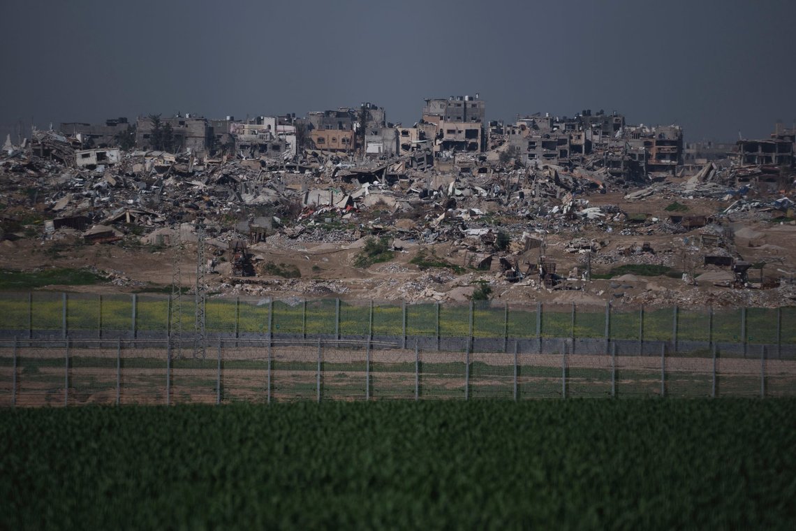 Bombed-out buildings on the eastern edge of Gaza City are visible across the double fence that separates the Strip from Kibbutz Nahal Oz, Israel, Wednesday, Feb. 7, 2024. (AP Photo/Leo Correa) Bombed-out buildings on the eastern edge of Gaza City are visible across the double fence that separates the Strip from Kibbutz Nahal Oz, Israel, Wednesday, Feb. 7, 2024. (AP Photo/Leo Correa)