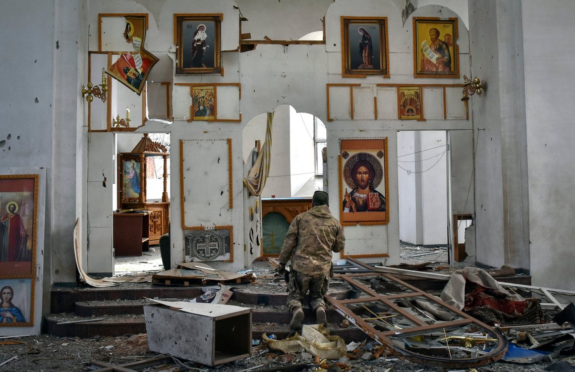 A Ukrainian serviceman kneels in prayer in a church damaged by a Russian air raid in Orikhiv, Zaporizhzhia region, Ukraine, April 5, 2024. (AP Photo/Andriy Andriyenko) A Ukrainian serviceman kneels in prayer in a church damaged by a Russian air raid in Orikhiv, Zaporizhzhia region, Ukraine, April 5, 2024. (AP Photo/Andriy Andriyenko)