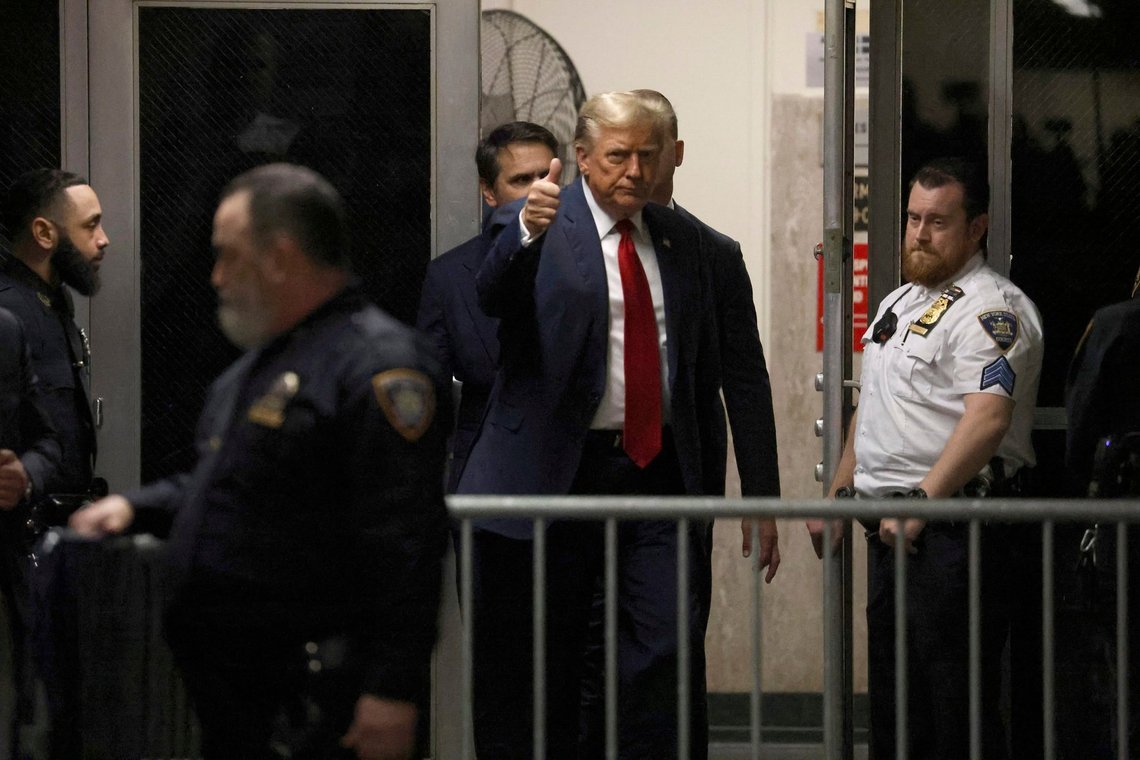 Republican presidential candidate Donald Trump gives a thumbs up as he returns to State Supreme Court in Manhattan after the lunch break on Monday, April 15, 2024, for the first day of his trial on charges of falsifying business records. (Jefferson Siegel/The New York Times via AP, Pool) Republican presidential candidate Donald Trump gives a thumbs up as he returns to State Supreme Court in Manhattan after the lunch break on Monday, April 15, 2024, for the first day of his trial on charges of falsifying business records. (Jefferson Siegel/The New York Times via AP, Pool)