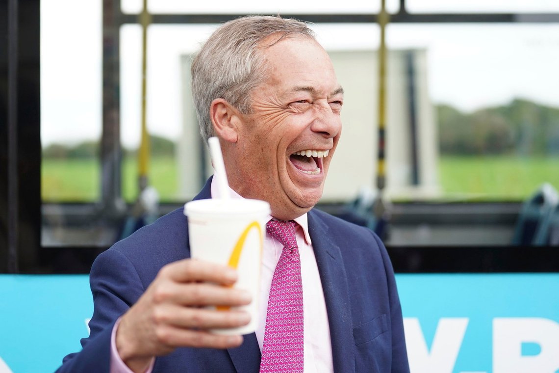 Leader of Reform UK Nigel Farage holds a McDonalds banana milkshake in Jaywick, Essex, England, Tuesday June 4, 2024. Mr Farage announced on Monday that he will stand for parliament in Clacton and lead Reform UK for the next five years. (James Manning/PA via AP) Leader of Reform UK Nigel Farage holds a McDonalds banana milkshake in Jaywick, Essex, England, Tuesday June 4, 2024. Mr Farage announced on Monday that he will stand for parliament in Clacton and lead Reform UK for the next five years. (James Manning/PA via AP)