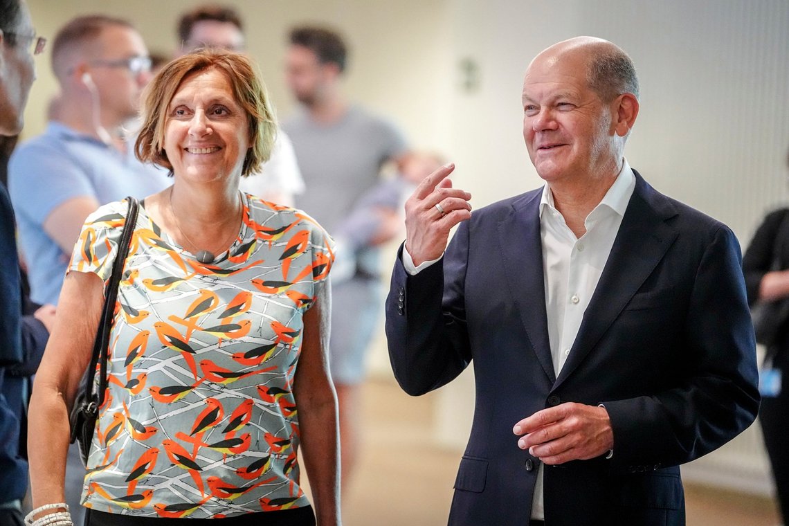 German Chancellor Olaf Scholz, right, waits in line with his wife his wife Britta Ernst to cast their vote for the European Parliament elections, in Potsdam, Germany, Sunday, June 9, 2024. Tens of millions across the European Union were voting in EU parliamentary elections on Sunday in a massive exercise of democracy that is expected to shift the bloc to the right and redirect its future. (Kay Nietfeld/dpa via AP) German Chancellor Olaf Scholz, right, waits in line with his wife his wife Britta Ernst to cast their vote for the European Parliament elections, in Potsdam, Germany, Sunday, June 9, 2024. Tens of millions across the European Union were voting in EU parliamentary elections on Sunday in a massive exercise of democracy that is expected to shift the bloc to the right and redirect its future. (Kay Nietfeld/dpa via AP)