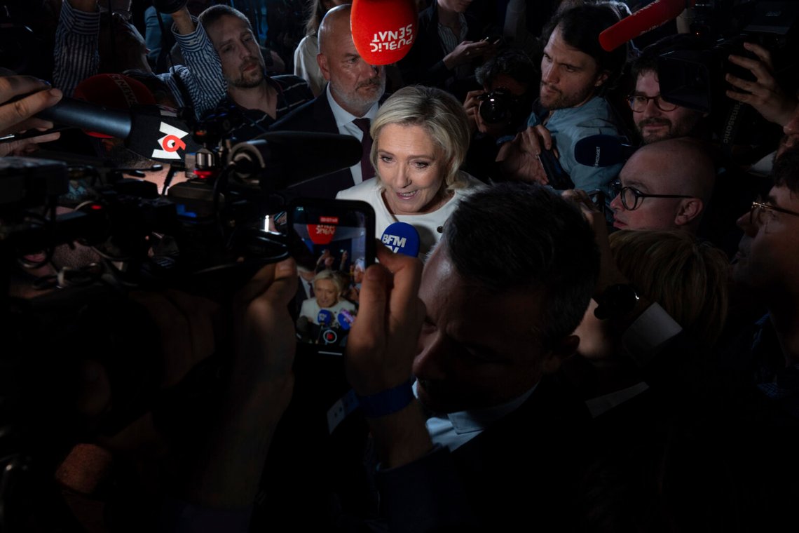 Far-right National Rally party leader Marine Le Pen answers reporters after the second round of the legislative election, Sunday, July 7, 2024, at the party election night headquarters in Paris. A coalition on the left that came together unexpectedly ahead of France's snap elections won the most parliamentary seats in the vote, according to polling projections Sunday. The surprise projections put President Emmanuel Macron's centrist alliance in second and the far right in third. (AP Photo/Louise Delmotte) Far-right National Rally party leader Marine Le Pen answers reporters after the second round of the legislative election, Sunday, July 7, 2024, at the party election night headquarters in Paris. A coalition on the left that came together unexpectedly ahead of France's snap elections won the most parliamentary seats in the vote, according to polling projections Sunday. The surprise projections put President Emmanuel Macron's centrist alliance in second and the far right in third. (AP Photo/Louise Delmotte)