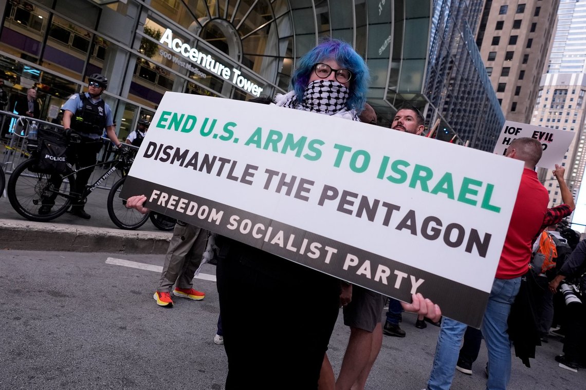 Protesters demonstrate near the Israeli Consulate during the Democratic National Convention Tuesday, Aug. 20, 2024, in Chicago. (AP Photo/Alex Brandon) Protesters demonstrate near the Israeli Consulate during the Democratic National Convention Tuesday, Aug. 20, 2024, in Chicago. (AP Photo/Alex Brandon)