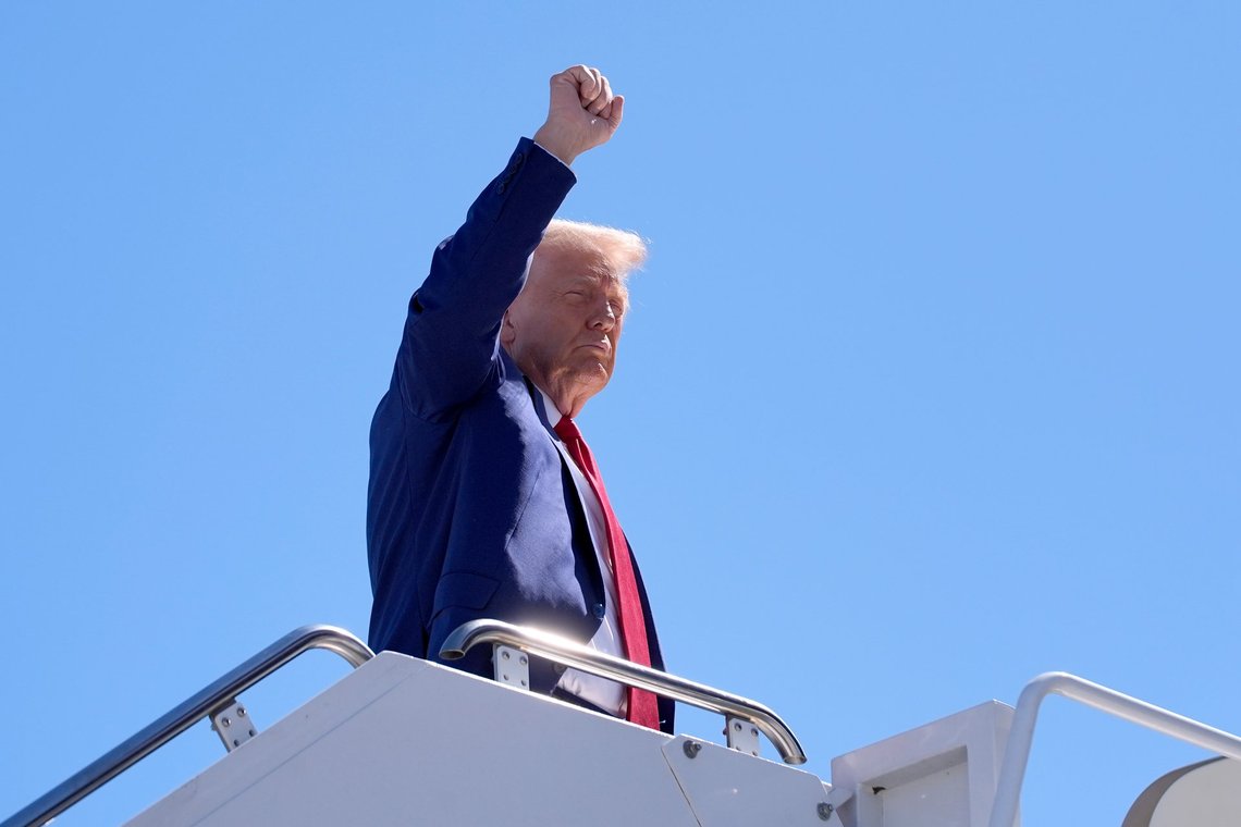 Republican presidential nominee former President Donald Trump gestures as he boards a plane at Harry Reid International Airport after a campaign trip, Saturday, Sept.14, 2024, in Las Vegas. (AP Photo/Alex Brandon) Republican presidential nominee former President Donald Trump gestures as he boards a plane at Harry Reid International Airport after a campaign trip, Saturday, Sept.14, 2024, in Las Vegas. (AP Photo/Alex Brandon)