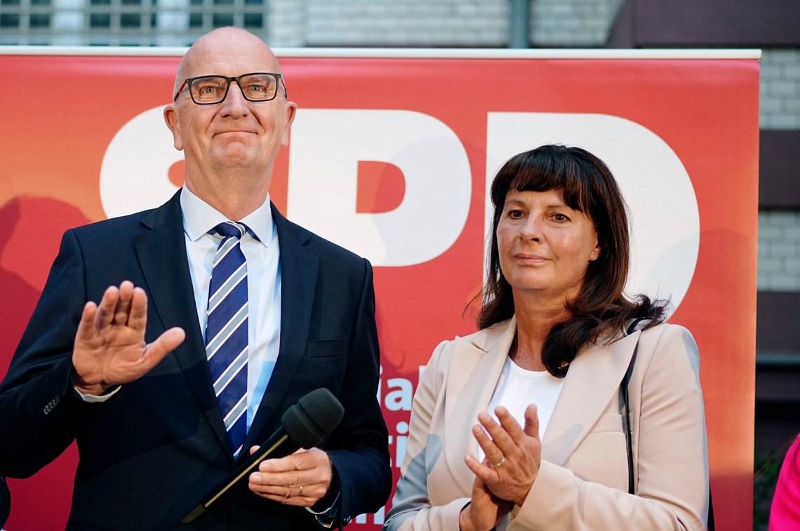 Dietmar Woidke, Brandenburg's Minister President and Chairman of the SPD in Brandenburg, and his wife Susanne are on stage at the SPD election party after the first forecasts were announced in Potsdam, Germany, Sunday Sept. 22, 2024. (Kay Nietfeld/dpa via AP) Dietmar Woidke, Brandenburg's Minister President and Chairman of the SPD in Brandenburg, and his wife Susanne are on stage at the SPD election party after the first forecasts were announced in Potsdam, Germany, Sunday Sept. 22, 2024. (Kay Nietfeld/dpa via AP)