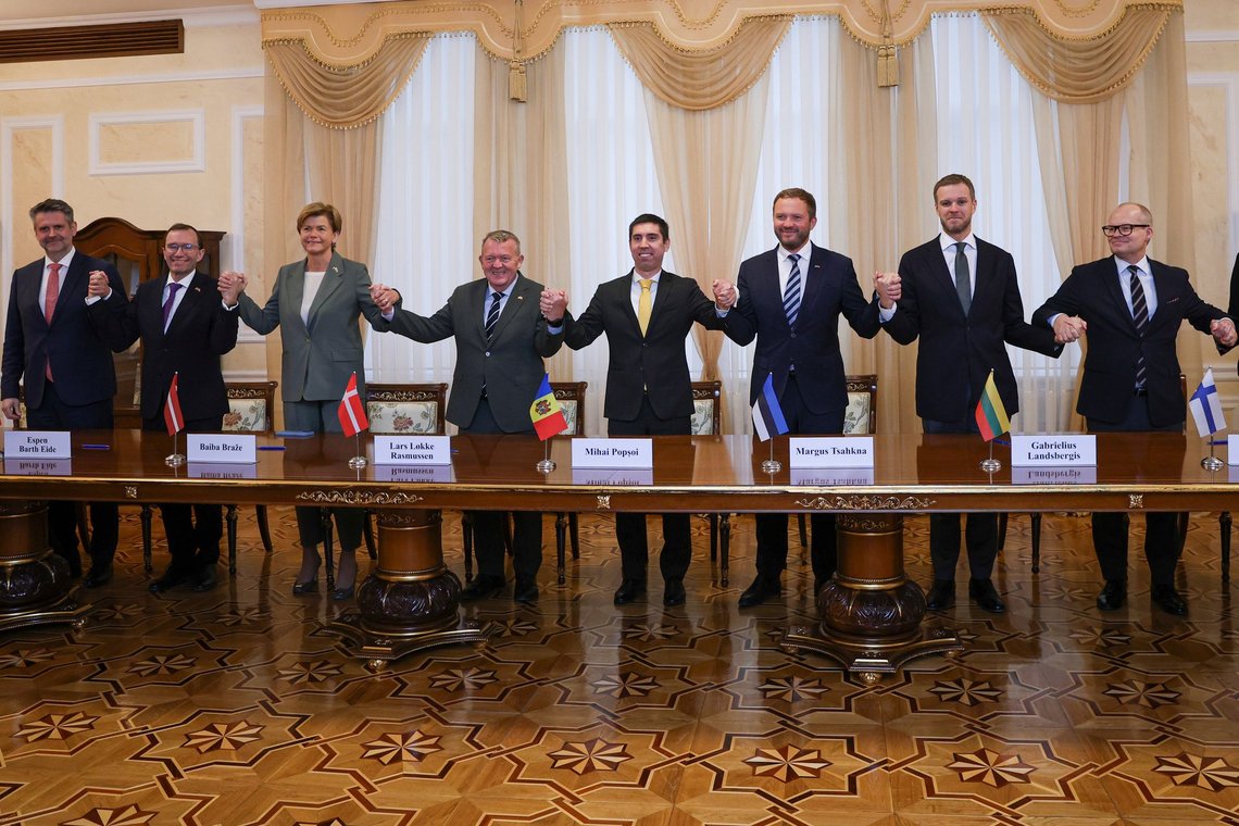 From left to right: Iceland's Secretary of State in the Foreign Ministry Martin Eyjolfsson, Norway's Foreign Minister Espen Barth Eide, Latvia's Foreign Minister Baiba Braze, Denmark's Foreign Minister Lars Lokke Rasmussen, Moldova's Foreign Minister, Mihai Popsoi, Estonia's Foreign Minister Margus Tsahkna, Lithuania's Foreign Minister Gabrielius Landsbergis, Finland's Secretary of State in the Foreign Ministry Pasi Rajala, hold hands as they pose after signing a document during a meeting of foreign ministers and state secretaries from the Nordic-Baltic Eight, in Chisinau Moldova, Tuesday, Oct.15, 2024. (AP Photo/Aurel Obreja) From left to right: Iceland's Secretary of State in the Foreign Ministry Martin Eyjolfsson, Norway's Foreign Minister Espen Barth Eide, Latvia's Foreign Minister Baiba Braze, Denmark's Foreign Minister Lars Lokke Rasmussen, Moldova's Foreign Minister, Mihai Popsoi, Estonia's Foreign Minister Margus Tsahkna, Lithuania's Foreign Minister Gabrielius Landsbergis, Finland's Secretary of State in the Foreign Ministry Pasi Rajala, hold hands as they pose after signing a document during a meeting of foreign ministers and state secretaries from the Nordic-Baltic Eight, in Chisinau Moldova, Tuesday, Oct.15, 2024. (AP Photo/Aurel Obreja)