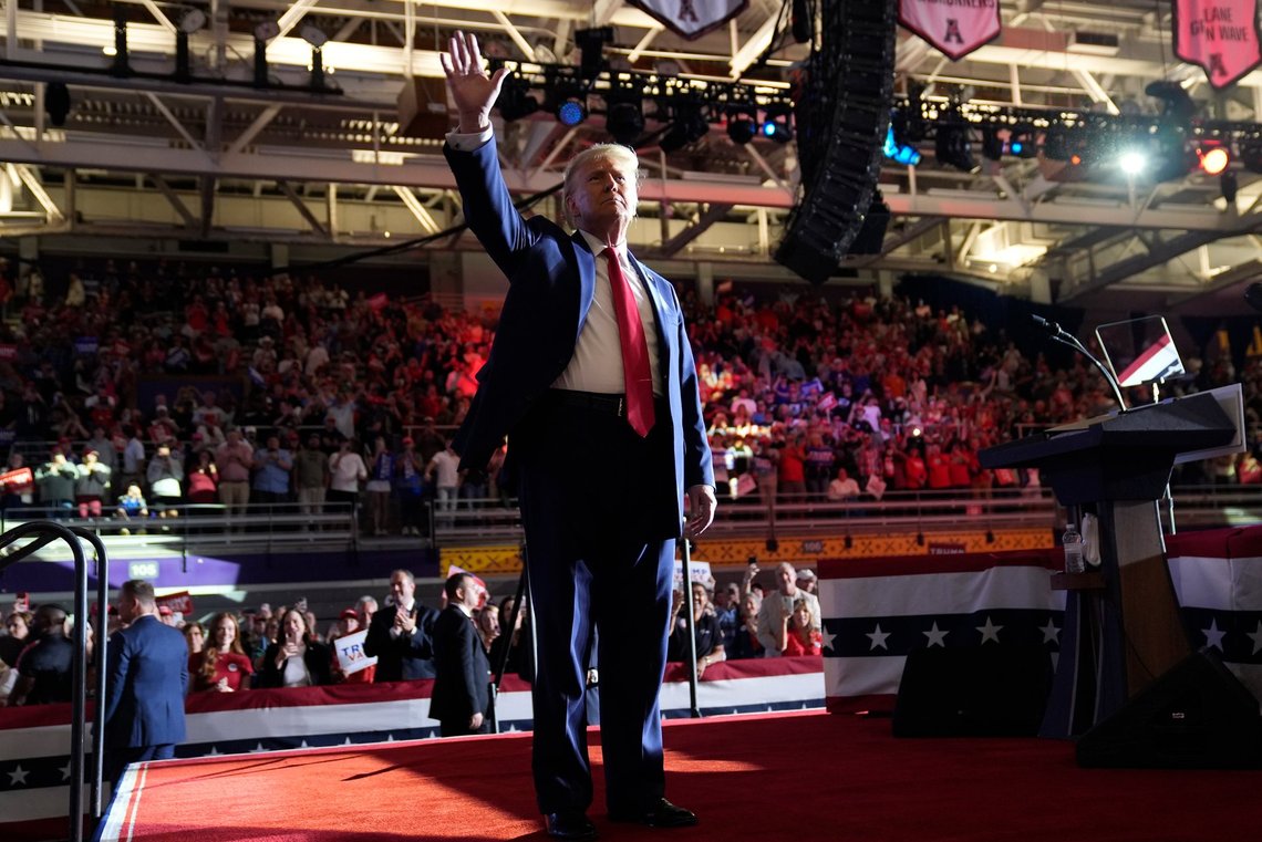 Republican presidential nominee former President Donald Trump waves after speaking at a campaign rally at Williams Arena at Mignes Coliseum, Monday, Oct. 21, 2024, in Greenville, N.C. (AP Photo/Evan Vucci) Republican presidential nominee former President Donald Trump waves after speaking at a campaign rally at Williams Arena at Mignes Coliseum, Monday, Oct. 21, 2024, in Greenville, N.C. (AP Photo/Evan Vucci)