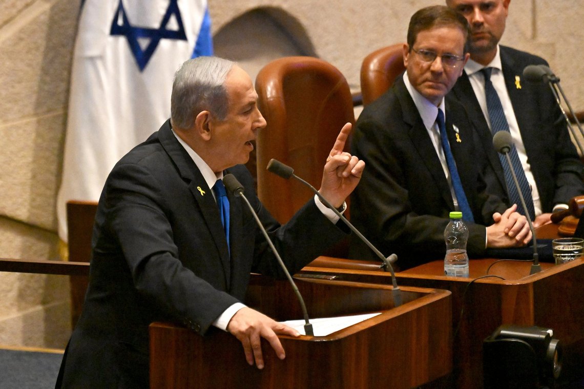 Israeli Prime Minister Benjamin Netanyahu speaks at the opening of the 25th Knesset session marking the anniversary of the "Iron Swords" war, in Jerusalem, Monday, Oct. 28, 2024. (Debbie Hill/Pool Photo via AP) Israeli Prime Minister Benjamin Netanyahu speaks at the opening of the 25th Knesset session marking the anniversary of the "Iron Swords" war, in Jerusalem, Monday, Oct. 28, 2024. (Debbie Hill/Pool Photo via AP)