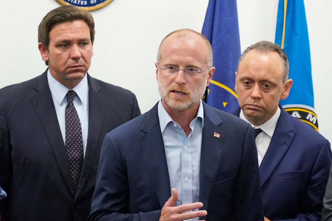 Brendan Carr, center, commissioner of the Federal Communications Commission, speaks during a news conference at the offices of Rep. Maria Elvira Salazar, R-Fla., alongside Florida Gov. Ron DeSantis, left, and Marcell Felipe, right, founder of the Inspire America Foundation, an organization dedicated to promoting democracy in Cuba and the Americas, Thursday, July 15, 2021, in Miami. DeSantis and other officials pressed the White House on Thursday to support efforts to preserve internet service to antigovernment protesters in Cuba, even advocating the use of giant balloons as floating Wi-Fi hotspots to allow images of dissent to stream unabated from the authoritarian nation. (AP Photo/Wilfredo Lee) Brendan Carr, center, commissioner of the Federal Communications Commission, speaks during a news conference at the offices of Rep. Maria Elvira Salazar, R-Fla., alongside Florida Gov. Ron DeSantis, left, and Marcell Felipe, right, founder of the Inspire America Foundation, an organization dedicated to promoting democracy in Cuba and the Americas, Thursday, July 15, 2021, in Miami. DeSantis and other officials pressed the White House on Thursday to support efforts to preserve internet service to antigovernment protesters in Cuba, even advocating the use of giant balloons as floating Wi-Fi hotspots to allow images of dissent to stream unabated from the authoritarian nation. (AP Photo/Wilfredo Lee)