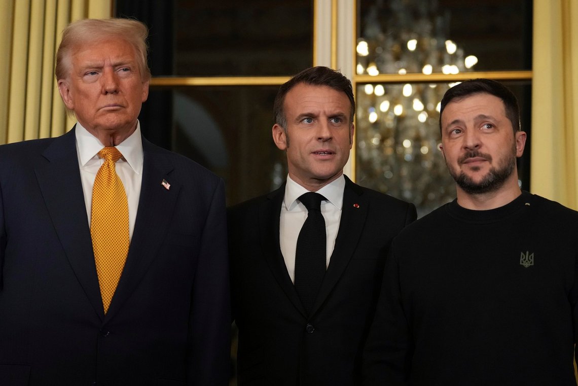 French President Emmanuel Macron, center, poses with President-elect Donald Trump, left, and Ukraine's President Volodymyr Zelenskyy at the Elysee Palace, Saturday, Dec. 7, 2024 in Paris. (AP Photo/Aurelien Morissard) French President Emmanuel Macron, center, poses with President-elect Donald Trump, left, and Ukraine's President Volodymyr Zelenskyy at the Elysee Palace, Saturday, Dec. 7, 2024 in Paris. (AP Photo/Aurelien Morissard)