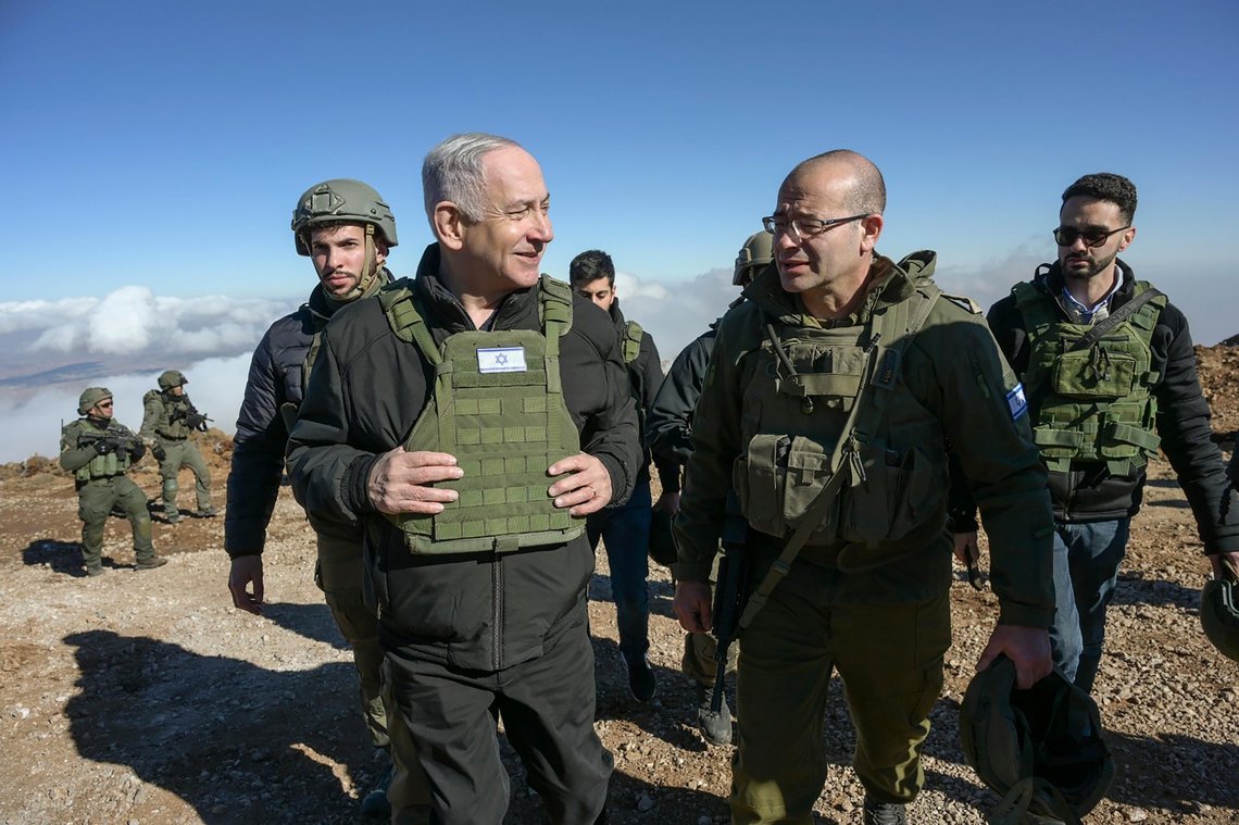 Israel's Prime Minister Benjamin Netanyahu, left, visits Israeli forces in a buffer zone inside Syria, Tuesday, Dec. 17, 2024. (Israel Government Press Office via AP) Israel's Prime Minister Benjamin Netanyahu, left, visits Israeli forces in a buffer zone inside Syria, Tuesday, Dec. 17, 2024. (Israel Government Press Office via AP)