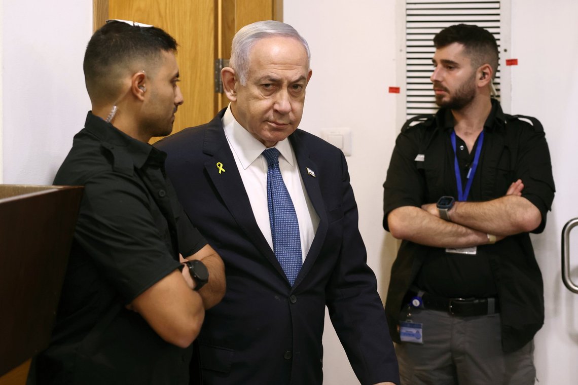 Israeli Prime Minister Benjamin Netanyahu attends his trial on corruption charges at the district court in Tel Aviv, Israel, Monday, Dec. 16, 2024. (Stoyan Nenov/Pool Photo via AP) Israeli Prime Minister Benjamin Netanyahu attends his trial on corruption charges at the district court in Tel Aviv, Israel, Monday, Dec. 16, 2024. (Stoyan Nenov/Pool Photo via AP)