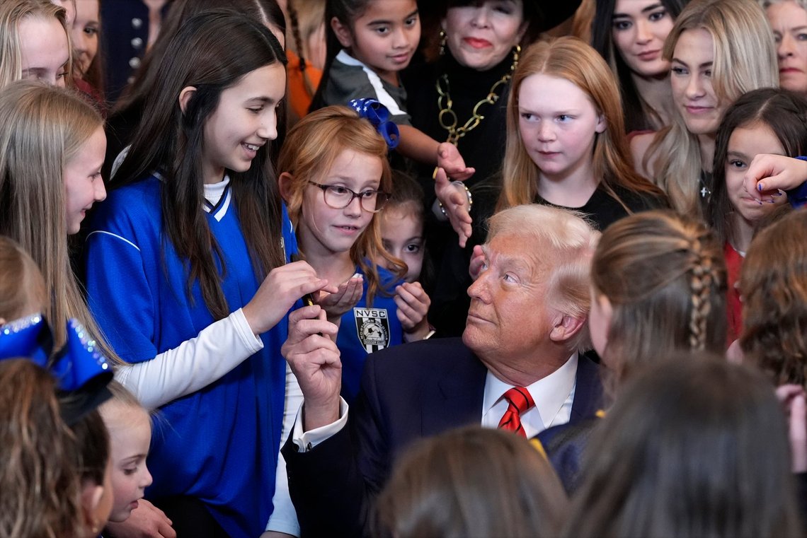 President Donald Trump hands out pens after signing an executive order barring transgender female athletes from competing in women's or girls' sporting events, in the East Room of the White House, Wednesday, Feb. 5, 2025, in Washington. (AP Photo/Alex Brandon) President Donald Trump hands out pens after signing an executive order barring transgender female athletes from competing in women's or girls' sporting events, in the East Room of the White House, Wednesday, Feb. 5, 2025, in Washington. (AP Photo/Alex Brandon)
