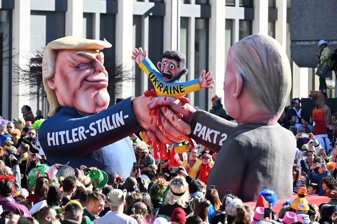 A carnival float with a Trump-Putin 'pact' motif during the traditional Rose Monday carnival parade in Duesseldorf, Germany, Monday, March 3, 2025. (Federico Gambarini/dpa via AP) A carnival float with a Trump-Putin 'pact' motif during the traditional Rose Monday carnival parade in Duesseldorf, Germany, Monday, March 3, 2025. (Federico Gambarini/dpa via AP)