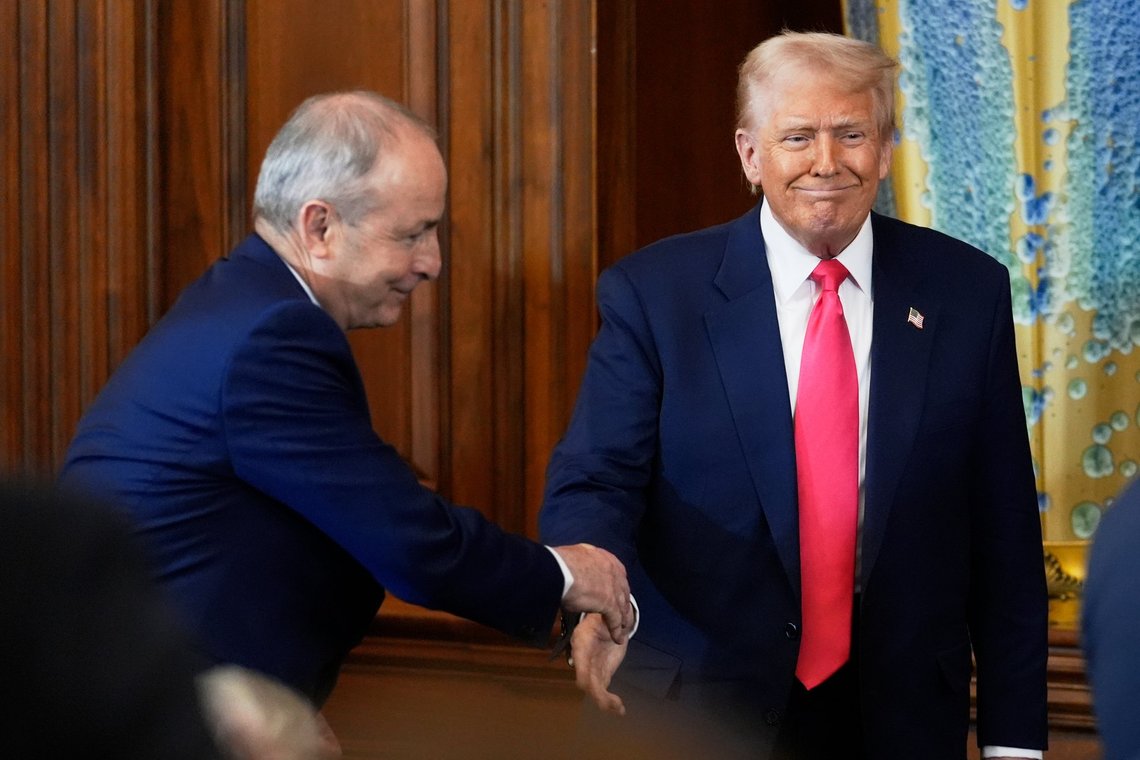 President Donald Trump greets Irelland's Prime Minister Michael Martin as he arrives to speak at the annual St. Patrick's Day luncheon at the Capitol in Washington, Wednesday, March 12, 2025. (AP Photo/J. Scott Applewhite) President Donald Trump greets Irelland's Prime Minister Michael Martin as he arrives to speak at the annual St. Patrick's Day luncheon at the Capitol in Washington, Wednesday, March 12, 2025. (AP Photo/J. Scott Applewhite)