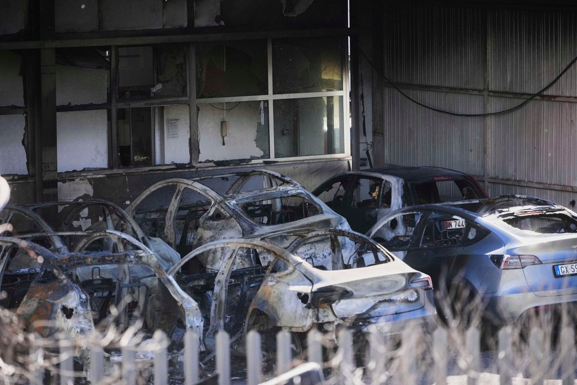 Burned Tesla cars are seen at a dealership on the outskirts of Rome, Monday, March 31, 2025. (AP Photo/Alessandra Tarantino) Burned Tesla cars are seen at a dealership on the outskirts of Rome, Monday, March 31, 2025. (AP Photo/Alessandra Tarantino)