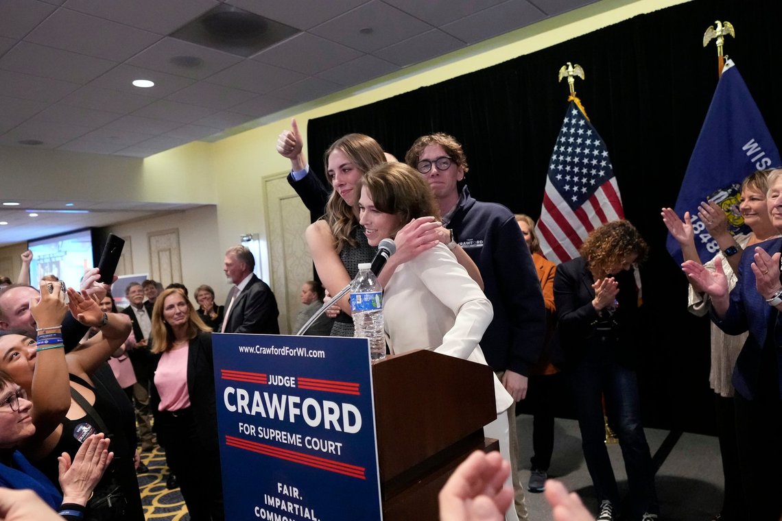 Wisconsin Supreme Court candidate Susan Crawford, center, hugs her daughter Maisie Peters, left, during Crawford's election night party after winning the election Tuesday, April 1, 2025, in Madison, Wis. (AP Photo/Kayla Wolf) Wisconsin Supreme Court candidate Susan Crawford, center, hugs her daughter Maisie Peters, left, during Crawford's election night party after winning the election Tuesday, April 1, 2025, in Madison, Wis. (AP Photo/Kayla Wolf)