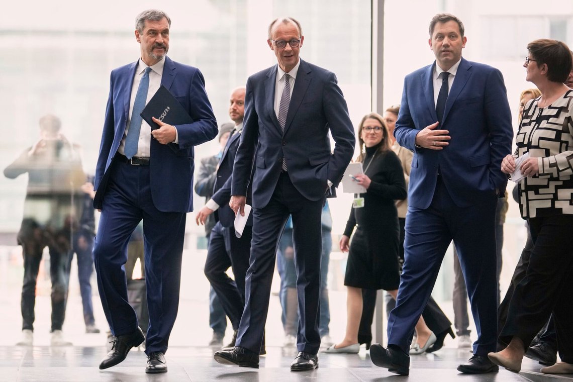 Markus Soeder, chairman of Bavarian's Christian Social Union party, Friedrich Merz, Christian Democratic Union party chairman and the Social Democratic Party co-leaders Lars Klingbeil and Saskia Esken, walk together before briefing the media after reaching an agreement between their parties on a coalition for a new German government at a news conference in Berlin, Germany, Wednesday, April 9, 2025. (AP Photo/Ebrahim Noroozi) Markus Soeder, chairman of Bavarian's Christian Social Union party, Friedrich Merz, Christian Democratic Union party chairman and the Social Democratic Party co-leaders Lars Klingbeil and Saskia Esken, walk together before briefing the media after reaching an agreement between their parties on a coalition for a new German government at a news conference in Berlin, Germany, Wednesday, April 9, 2025. (AP Photo/Ebrahim Noroozi)