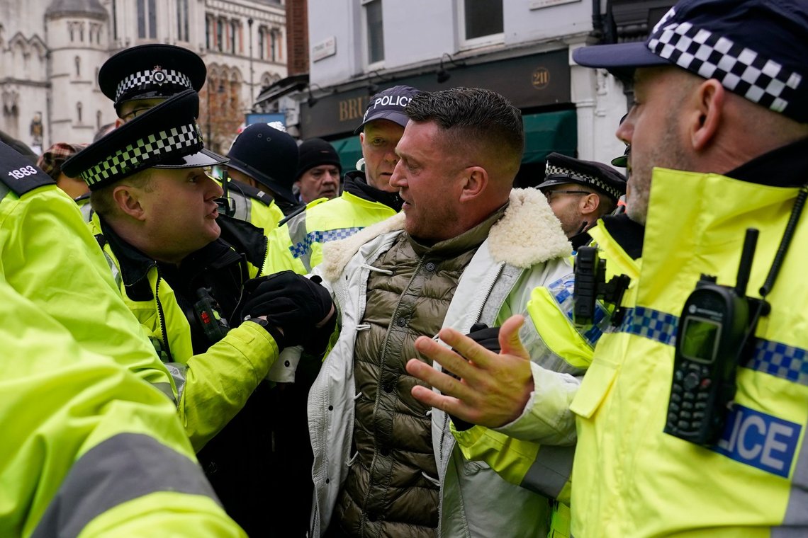 Far-right activist Stephen Yaxley-Lennon known as Tommy Robinson is arrested by polices during an anti-Semitism demonstration in London, Sunday, Nov. 26, 2023. (AP Photo/Alberto Pezzali) Far-right activist Stephen Yaxley-Lennon known as Tommy Robinson is arrested by polices during an anti-Semitism demonstration in London, Sunday, Nov. 26, 2023. (AP Photo/Alberto Pezzali)