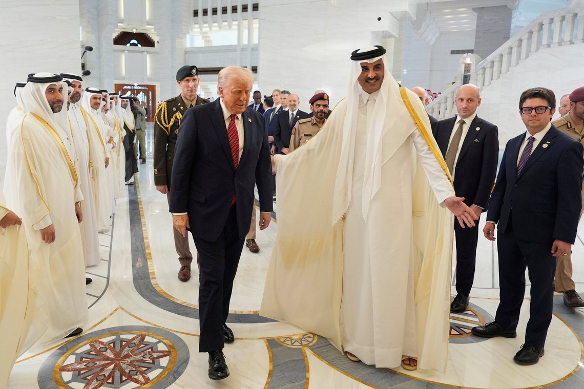Qatar's Emir Sheikh Tamim bin Hamad Al Thani welcomes President Donald Trump during an official welcoming ceremony at the Amiri Diwan in Doha, Qatar, Wednesday, May 14, 2025. (AP Photo/Alex Brandon) Qatar's Emir Sheikh Tamim bin Hamad Al Thani welcomes President Donald Trump during an official welcoming ceremony at the Amiri Diwan in Doha, Qatar, Wednesday, May 14, 2025. (AP Photo/Alex Brandon)