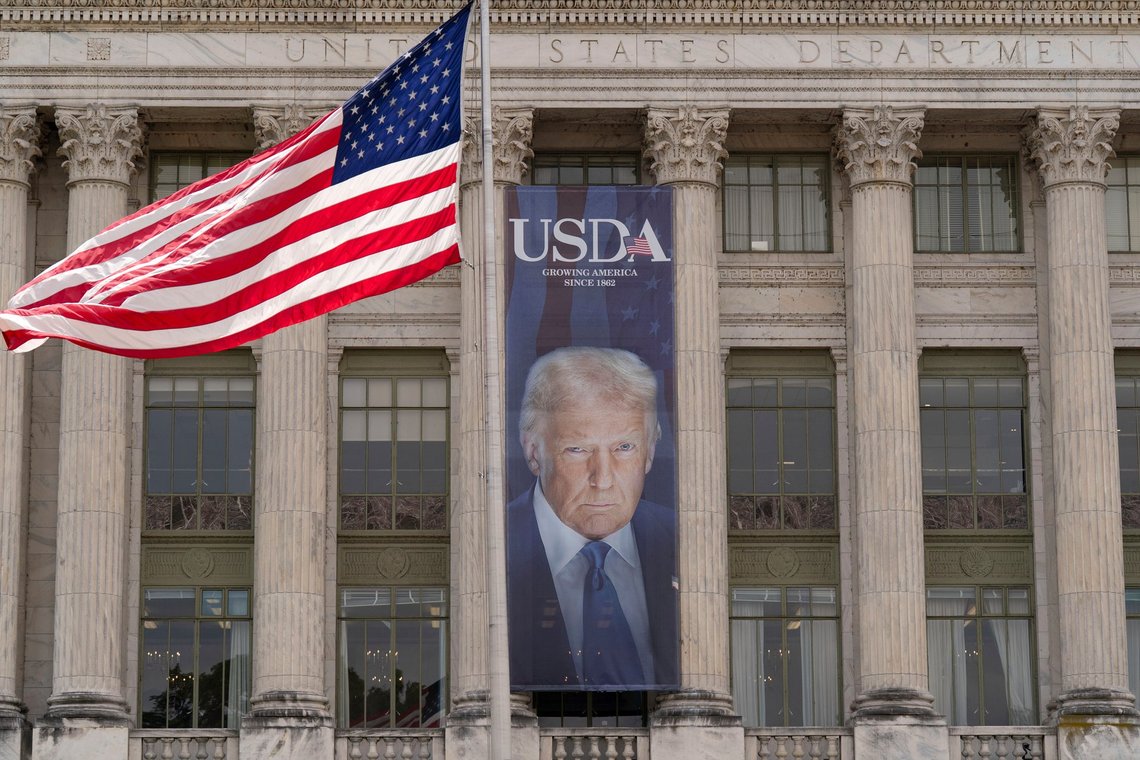 A banner with a photograph of President Donald Trump hangs near the entrance of the U.S. Department of Agriculture building in Washington, Friday, May 16, 2025. (AP Photo/Jose Luis Magana) A banner with a photograph of President Donald Trump hangs near the entrance of the U.S. Department of Agriculture building in Washington, Friday, May 16, 2025. (AP Photo/Jose Luis Magana)