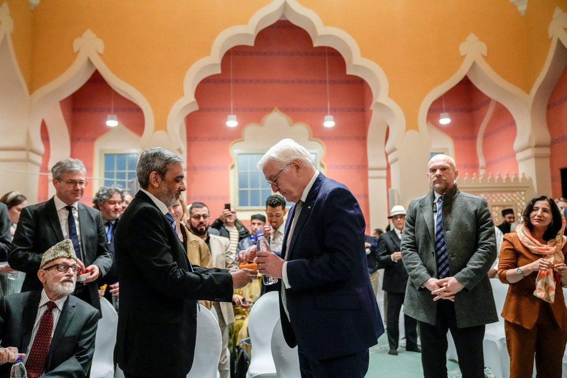 German President Frank-Walter Steinmeier joins fasting Muslims at an Iftar dinner at the Wilmersdorf mosque, during the Muslim holy month of Ramadan in Berlin, Germany, Wednesday, March 12, 2025. (AP Photo/Ebrahim Noroozi) German President Frank-Walter Steinmeier joins fasting Muslims at an Iftar dinner at the Wilmersdorf mosque, during the Muslim holy month of Ramadan in Berlin, Germany, Wednesday, March 12, 2025. (AP Photo/Ebrahim Noroozi)