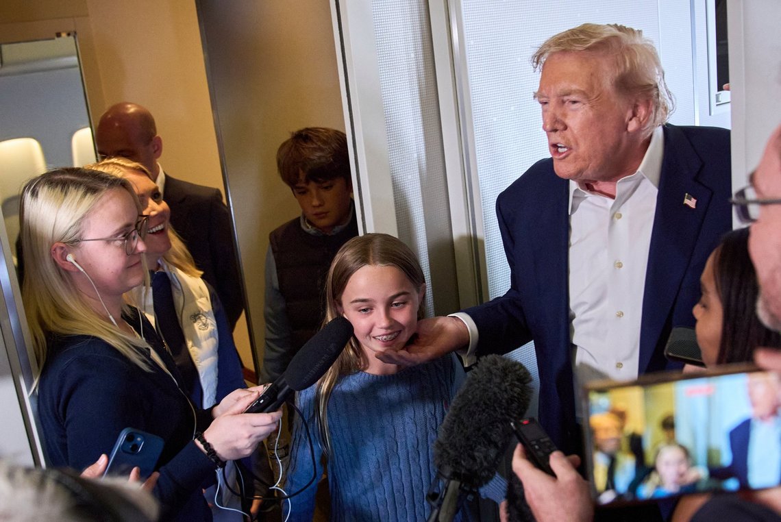 President Donald Trump tells reporters about his granddaughter's accomplishments in golf, as his grandchildren Chloe and Spencer attend while the President speaks aboard Air Force One after leaving Aberdeen, Scotland, Tuesday, July 29, 2025, en route to Washington. (AP Photo/Jacquelyn Martin) President Donald Trump tells reporters about his granddaughter's accomplishments in golf, as his grandchildren Chloe and Spencer attend while the President speaks aboard Air Force One after leaving Aberdeen, Scotland, Tuesday, July 29, 2025, en route to Washington. (AP Photo/Jacquelyn Martin)