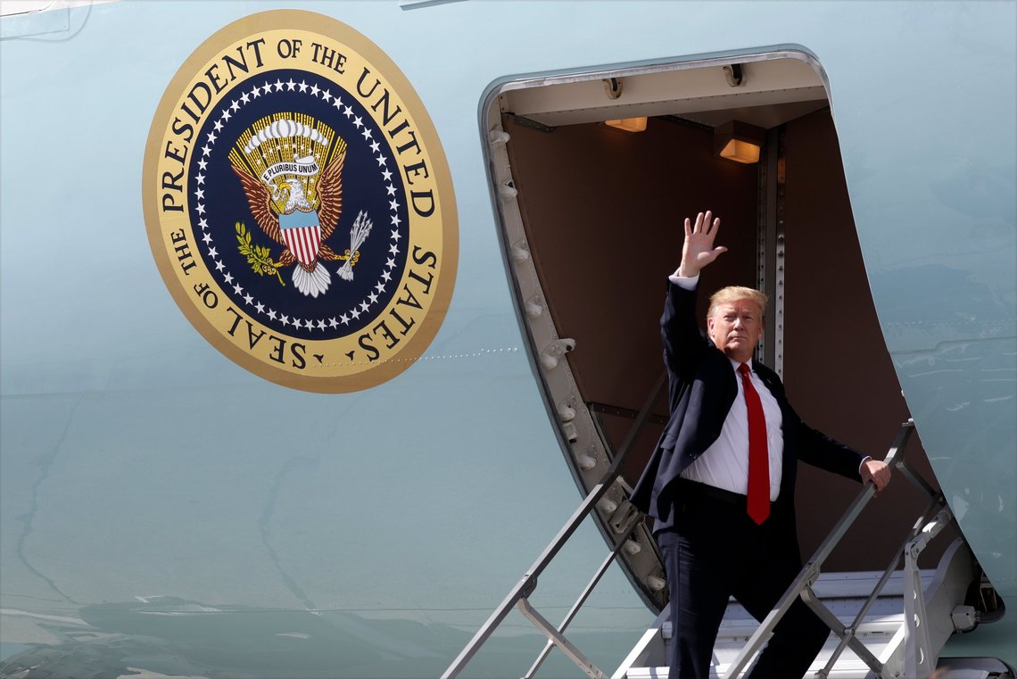 FILE - President Donald Trump waves after greeting troops at Joint Base Elmendorf-Richardson for a refueling stop en route to Japan, May 24, 2019, in Anchorage. (AP Photo/Evan Vucci, File) FILE - President Donald Trump waves after greeting troops at Joint Base Elmendorf-Richardson for a refueling stop en route to Japan, May 24, 2019, in Anchorage. (AP Photo/Evan Vucci, File)