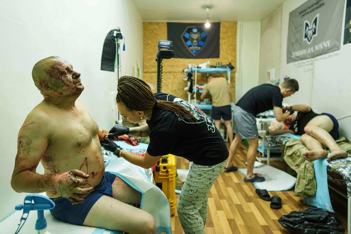 Medics of Da Vinci Wolves Battalion treat Ukrainian soldiers injured during fighting with Russian forces on the front line at stabilization point on Pokrovsk direction, Ukraine, on Monday, Aug. 11, 2025. (AP Photo/Evgeniy Maloletka) Medics of Da Vinci Wolves Battalion treat Ukrainian soldiers injured during fighting with Russian forces on the front line at stabilization point on Pokrovsk direction, Ukraine, on Monday, Aug. 11, 2025. (AP Photo/Evgeniy Maloletka)