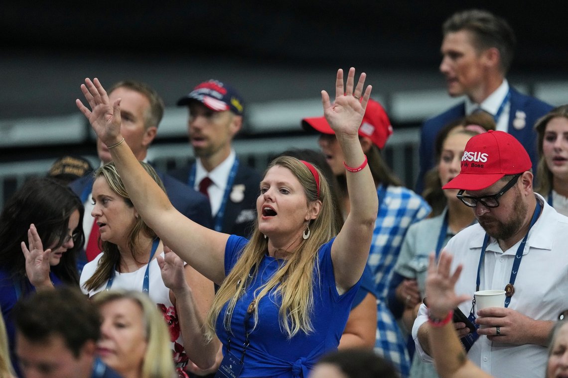 A woman listens during a worship song before the start of a memorial for conservative activist Charlie Kirk, Sunday, Sept. 21, 2025, at State Farm Stadium in Glendale, Ariz. (AP Photo/Ross D. Franklin) A woman listens during a worship song before the start of a memorial for conservative activist Charlie Kirk, Sunday, Sept. 21, 2025, at State Farm Stadium in Glendale, Ariz. (AP Photo/Ross D. Franklin)