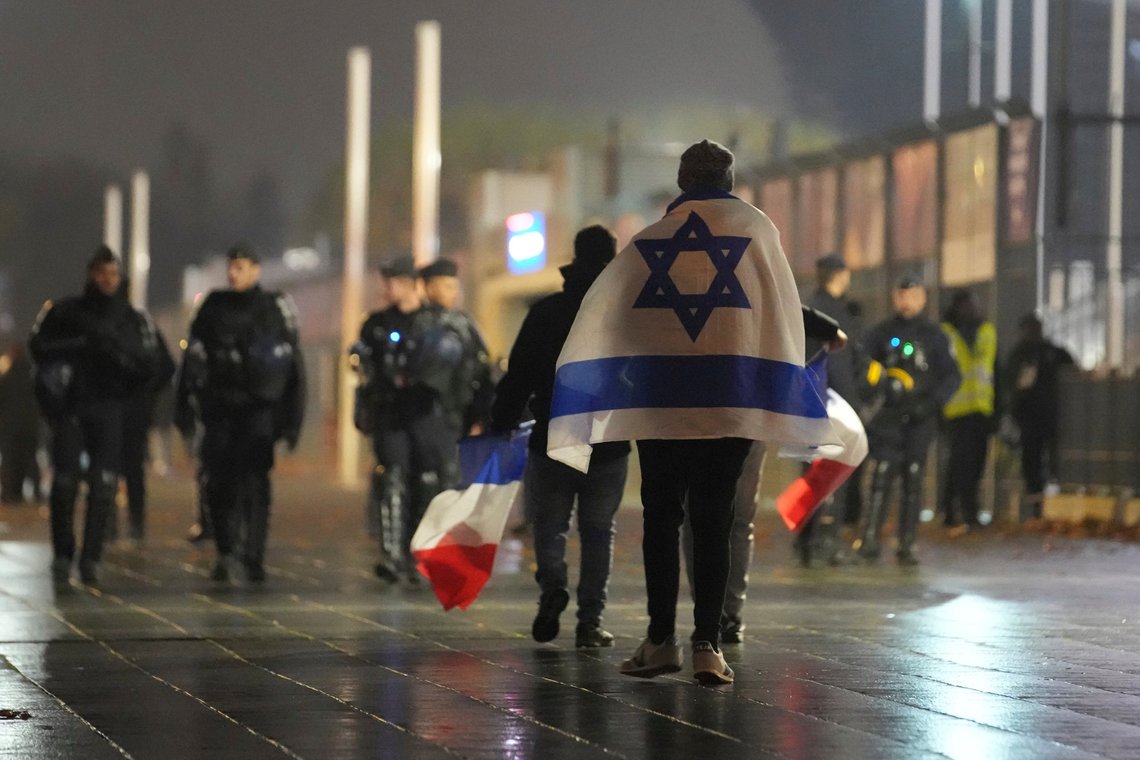Soccer supporters leave after the Nations League soccer match France against Israel outside the Stade de France stadium, Thursday, Nov. 14, 2024 in Saint-Denis, outside Paris. (AP Photo/Christophe Ena) Soccer supporters leave after the Nations League soccer match France against Israel outside the Stade de France stadium, Thursday, Nov. 14, 2024 in Saint-Denis, outside Paris. (AP Photo/Christophe Ena)