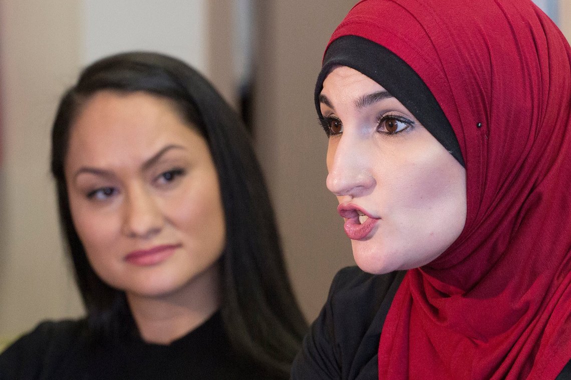 FILE - In this Jan. 9, 2017 file photo Linda Sarsour, right, and Carmen Perez, co-chairs of the Women's March on Washington, speak during an interview in New York. Sarsour was scheduled to speak at a college commencement ceremony in New York City on Thursday, June 1, 2017, despite protests from critics who don't like her views on Israel. (AP Photo/Mark Lennihan, File) FILE - In this Jan. 9, 2017 file photo Linda Sarsour, right, and Carmen Perez, co-chairs of the Women's March on Washington, speak during an interview in New York. Sarsour was scheduled to speak at a college commencement ceremony in New York City on Thursday, June 1, 2017, despite protests from critics who don't like her views on Israel. (AP Photo/Mark Lennihan, File)