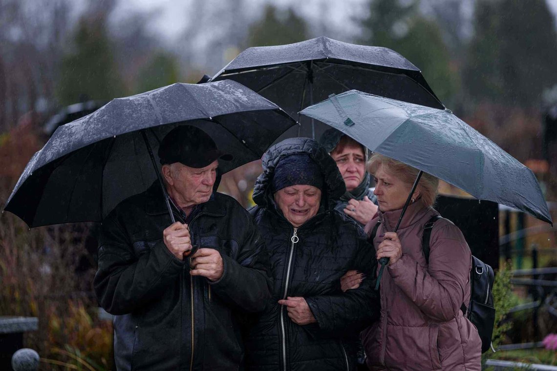 Parents Natalia and Anatoliy cry at the coffin of their son Ruslan Zhygunov, a Ukrainian serviceman, who was killed at the frontline near Rusyn Yar village, during his funeral ceremony in Hostomel, Ukraine, on Saturday, Nov. 22, 2025. (AP Photo/Evgeniy Maloletka) Parents Natalia and Anatoliy cry at the coffin of their son Ruslan Zhygunov, a Ukrainian serviceman, who was killed at the frontline near Rusyn Yar village, during his funeral ceremony in Hostomel, Ukraine, on Saturday, Nov. 22, 2025. (AP Photo/Evgeniy Maloletka)