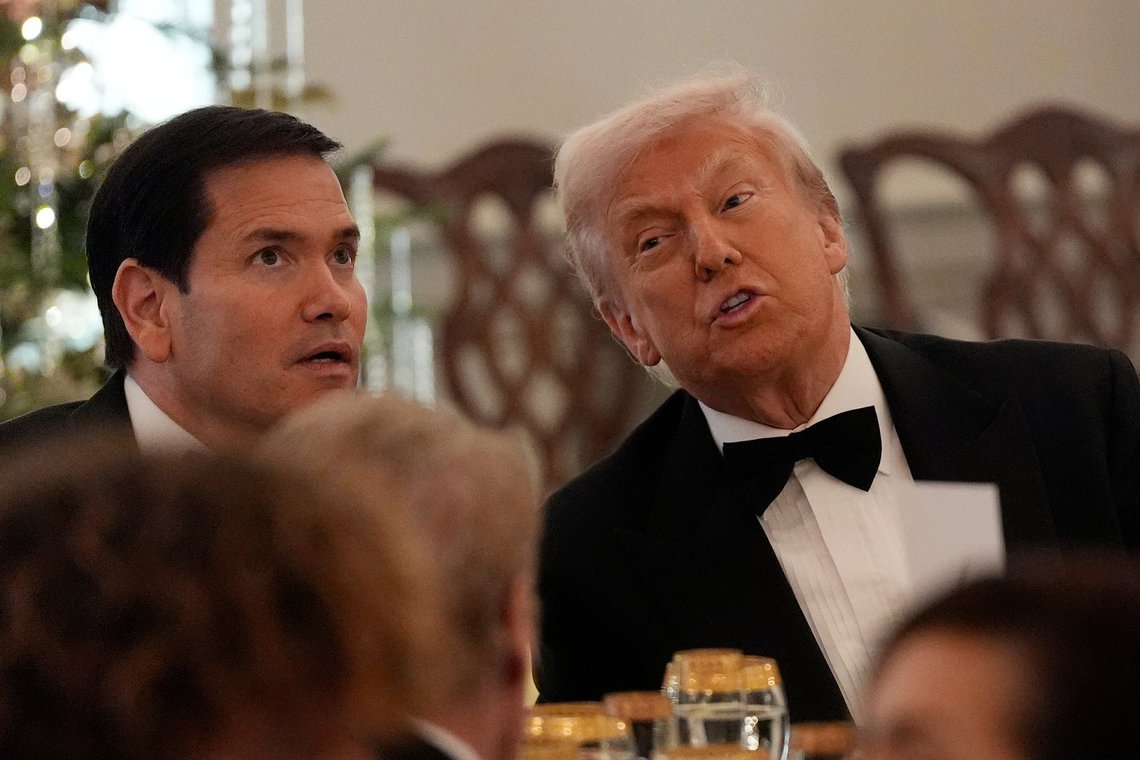 President Donald Trump, right, seated with Sec. of State Marco Rubio, left, at a Kennedy Center Honors reception for recipients at the State Department, Saturday, Dec. 6, 2025, in Washington. (AP Photo/Julia Demaree Nikhinson) President Donald Trump, right, seated with Sec. of State Marco Rubio, left, at a Kennedy Center Honors reception for recipients at the State Department, Saturday, Dec. 6, 2025, in Washington. (AP Photo/Julia Demaree Nikhinson)