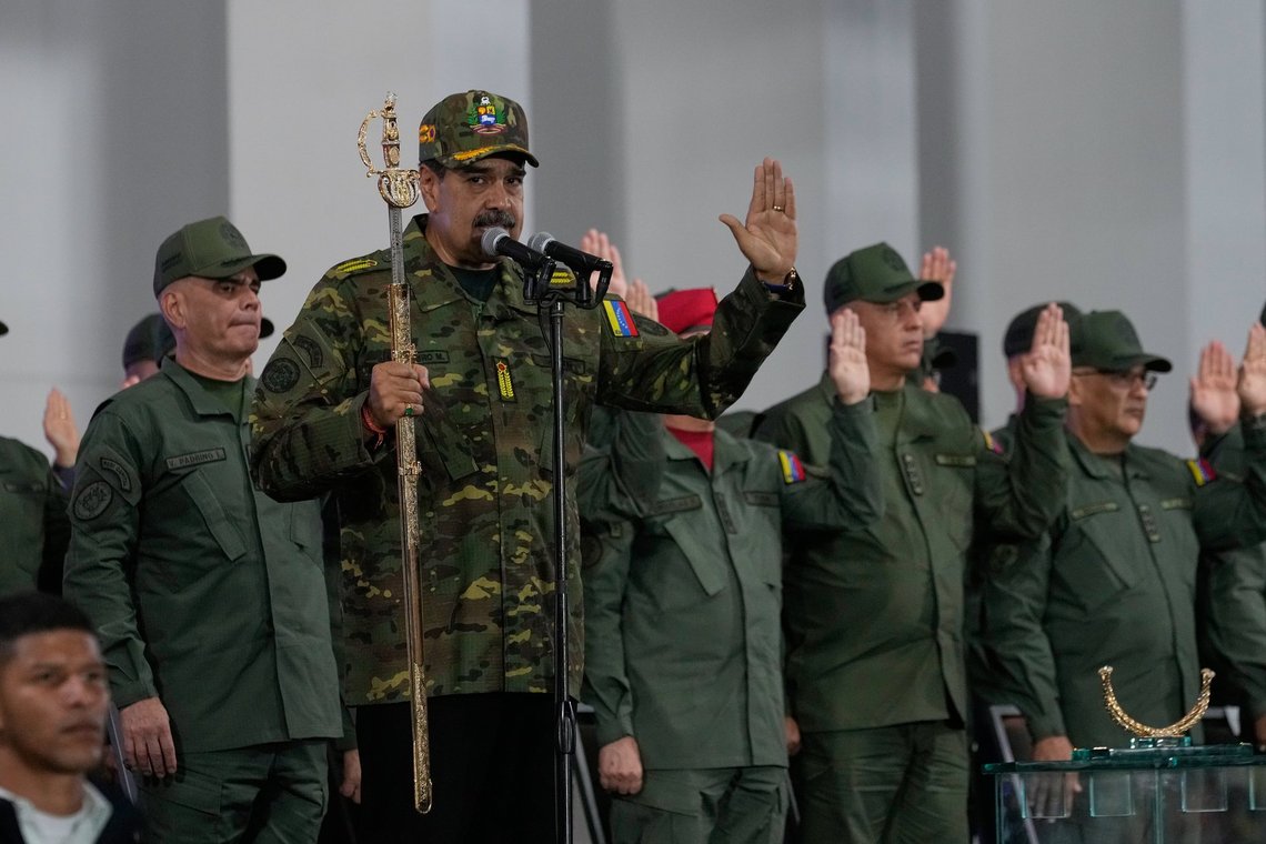Venezuelan President Nicolas Maduro administers an oath during a civic-military event at the military academy in Caracas, Venezuela, Tuesday, Nov. 25, 2025. (AP Photo/Ariana Cubillos) Venezuelan President Nicolas Maduro administers an oath during a civic-military event at the military academy in Caracas, Venezuela, Tuesday, Nov. 25, 2025. (AP Photo/Ariana Cubillos)