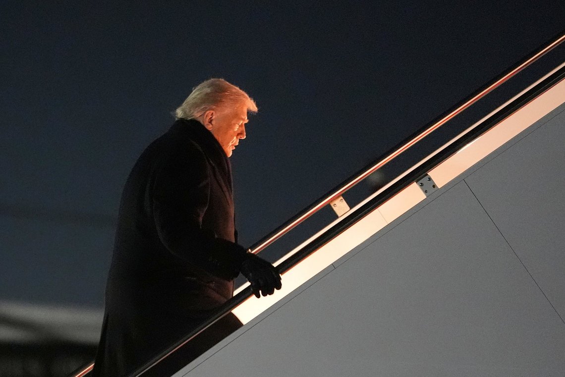 President Donald Trump boards Air Force One for a trip to attend the World Economic Form in Davos, Tuesday, Jan. 20, 2026, at Joint Base Andrews, Md. (AP Photo/Evan Vucci) President Donald Trump boards Air Force One for a trip to attend the World Economic Form in Davos, Tuesday, Jan. 20, 2026, at Joint Base Andrews, Md. (AP Photo/Evan Vucci)