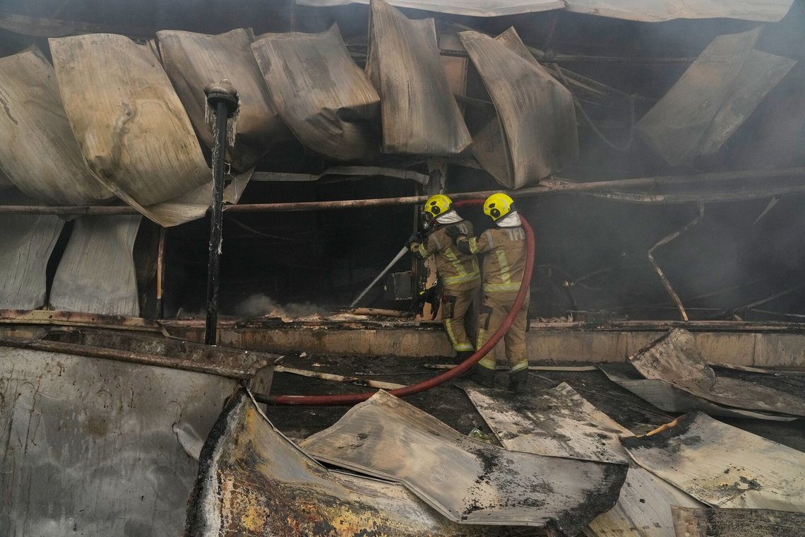 Firefighters work to extinguish a fire at the Jannat market in western Tehran, Iran, Tuesday, Feb. 3, 2026. (AP Photo/Vahid Salemi) Firefighters work to extinguish a fire at the Jannat market in western Tehran, Iran, Tuesday, Feb. 3, 2026. (AP Photo/Vahid Salemi)