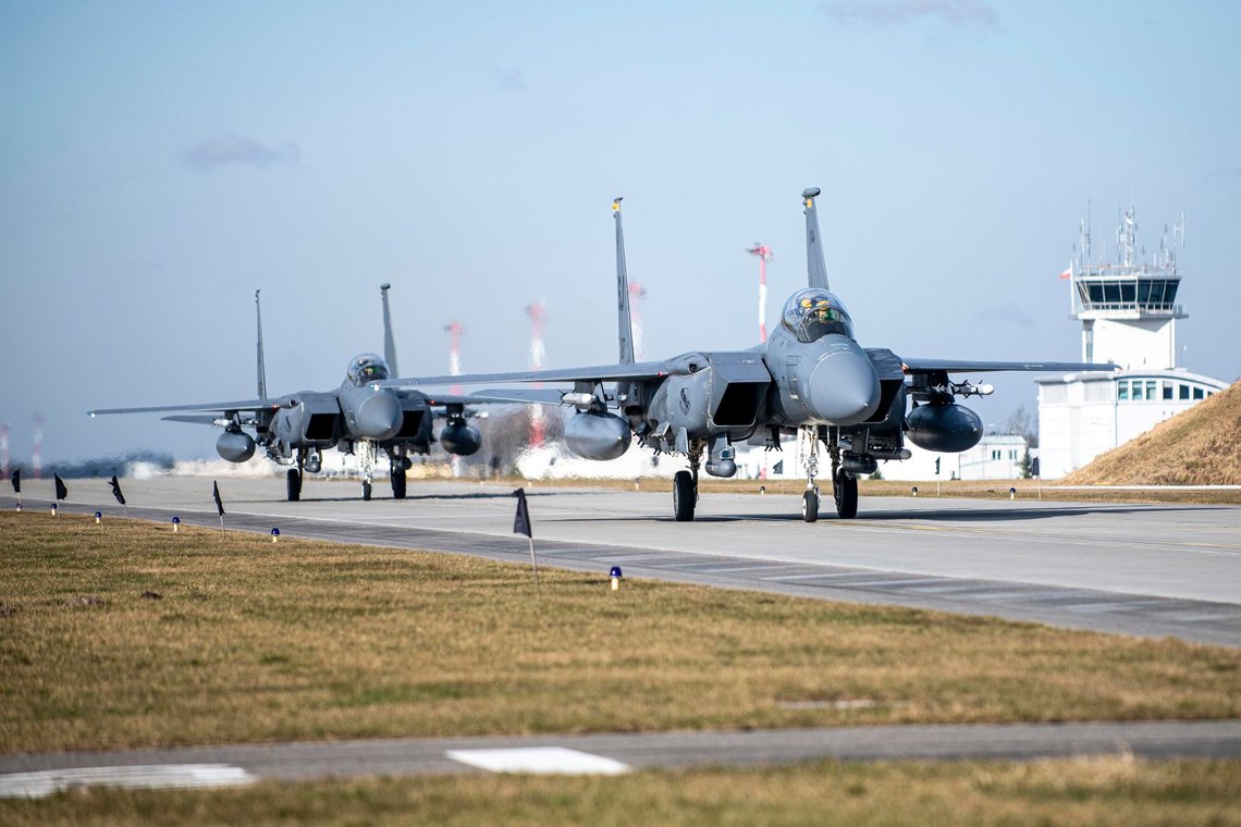 In this image provided by the U.S. Air Force, U.S. Air Force F-15E Strike Eagles from the 336th Fighter Squadron assigned to Seymour Johnson Air Force Base, N.C., taxi to their parking spots after completing a NATO Enhanced Air Policing mission out of Lask Air Base, Poland, Monday, Feb. 28, 2022. (Tech. Sgt. Jacob Albers/U.S. Air Force via AP) In this image provided by the U.S. Air Force, U.S. Air Force F-15E Strike Eagles from the 336th Fighter Squadron assigned to Seymour Johnson Air Force Base, N.C., taxi to their parking spots after completing a NATO Enhanced Air Policing mission out of Lask Air Base, Poland, Monday, Feb. 28, 2022. (Tech. Sgt. Jacob Albers/U.S. Air Force via AP)