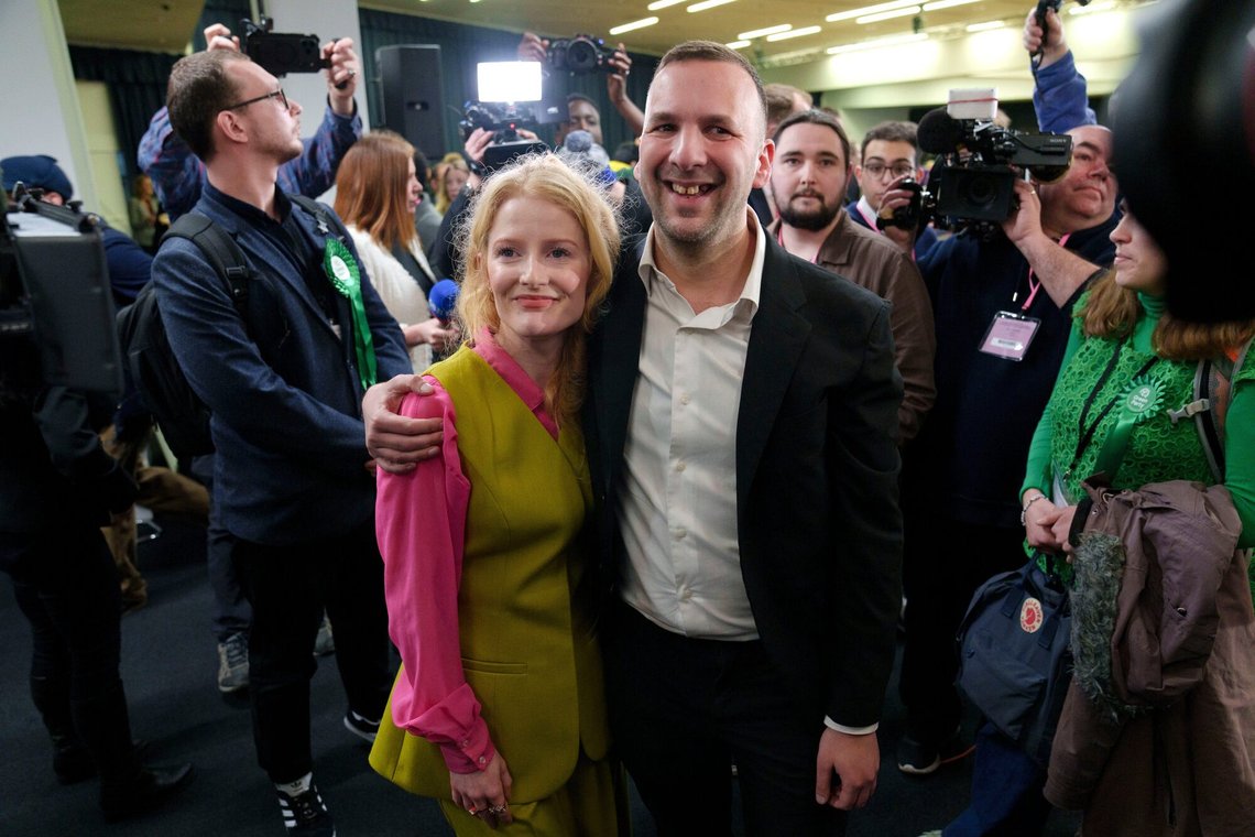 CORRECTS DATE - Greens Party candidate Hannah Spencer, left, stands with party leader Zack Polanski after winning the Gorton and Denton by-election, Manchester, England, Friday, Feb. 27, 2026. (AP Photo/Jon Super) CORRECTS DATE - Greens Party candidate Hannah Spencer, left, stands with party leader Zack Polanski after winning the Gorton and Denton by-election, Manchester, England, Friday, Feb. 27, 2026. (AP Photo/Jon Super)