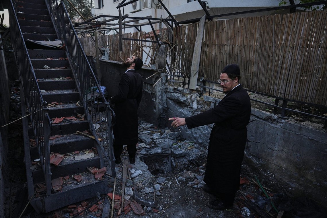 Residents inspect a damaged house struck by a rocket fired from Lebanon, in Hatzor HaGlilit, northern Israel, Wednesday, March 4, 2026. (AP Photo/Ariel Schalit) Residents inspect a damaged house struck by a rocket fired from Lebanon, in Hatzor HaGlilit, northern Israel, Wednesday, March 4, 2026. (AP Photo/Ariel Schalit)