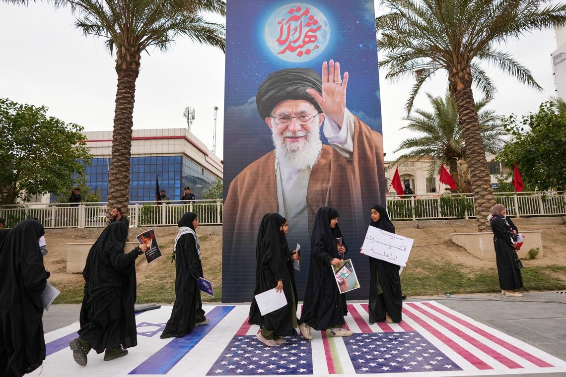 Iraqi step on a representation of an U.S. flag flags and Israeli flag during a protest against U.S. and Israeli attacks on multiple cities across Iran, in Baghdad, Iraq, Thursday, March 12, 2026. (AP Photo/Hadi Mizban) Iraqi step on a representation of an U.S. flag flags and Israeli flag during a protest against U.S. and Israeli attacks on multiple cities across Iran, in Baghdad, Iraq, Thursday, March 12, 2026. (AP Photo/Hadi Mizban)
