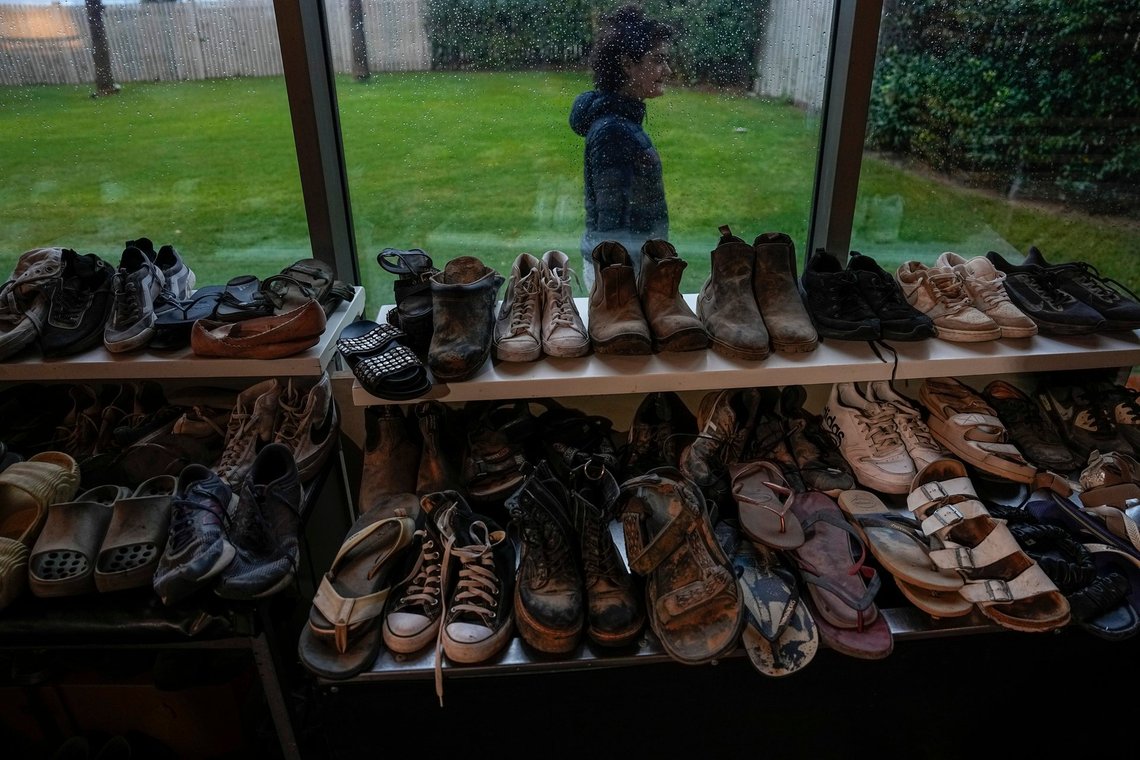 Shoes of victims killed during Hamas' attack on the Nova Music Festival are on display as family members are called up to collect them in Kibbutz Sdot Yam, Israel, Nov. 19, 2023. At least 360 Israelis were killed by Hamas militants at the outdoor music festival, among the total 1,200 people killed during Hamas' bloody Oct. 7 cross-border assault. (AP Photo/Ariel Schalit) Shoes of victims killed during Hamas' attack on the Nova Music Festival are on display as family members are called up to collect them in Kibbutz Sdot Yam, Israel, Nov. 19, 2023. At least 360 Israelis were killed by Hamas militants at the outdoor music festival, among the total 1,200 people killed during Hamas' bloody Oct. 7 cross-border assault. (AP Photo/Ariel Schalit)