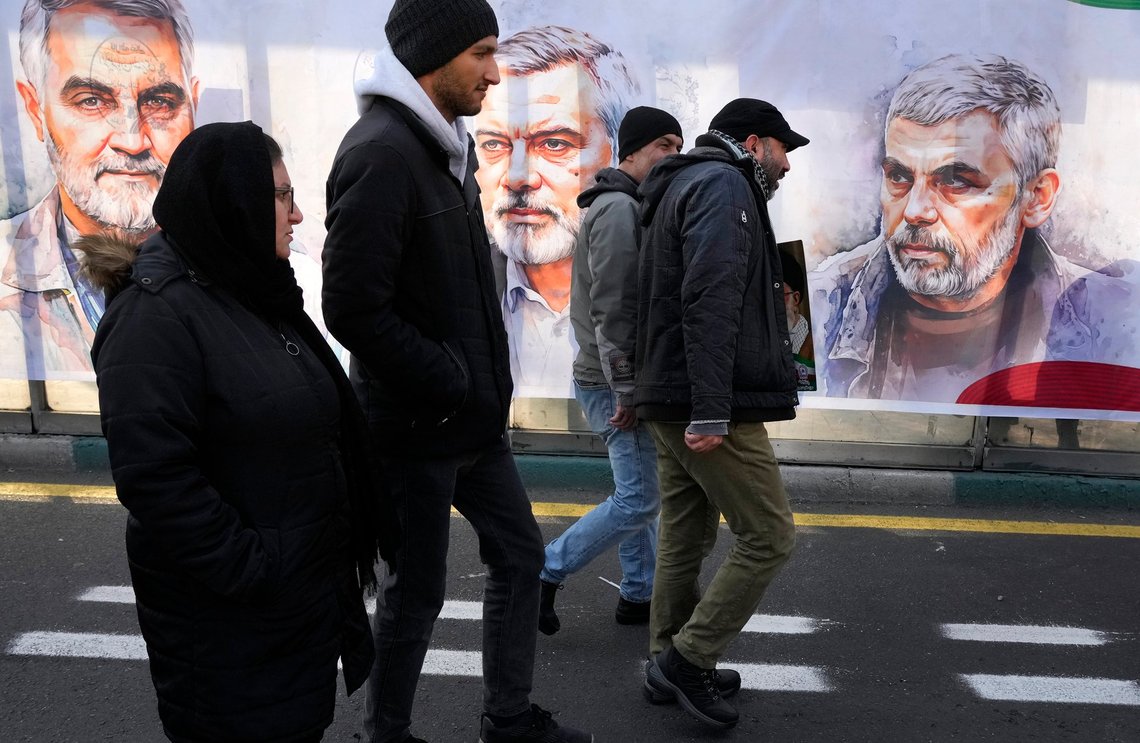 People march in front of portraits of the late Hamas leaders Yahya Sinwar, right, Ismail Haniyeh, center, who were killed by Israel and the late Iran's Revolutionary Guard Gen. Qassem Soleimani, who was killed in a U.S. drone attack in 2020, in a rally commemorating the anniversary of Iran's 1979 Islamic Revolution, in Tehran, Iran, Monday, Feb. 10, 2025. (AP Photo/Vahid Salemi) People march in front of portraits of the late Hamas leaders Yahya Sinwar, right, Ismail Haniyeh, center, who were killed by Israel and the late Iran's Revolutionary Guard Gen. Qassem Soleimani, who was killed in a U.S. drone attack in 2020, in a rally commemorating the anniversary of Iran's 1979 Islamic Revolution, in Tehran, Iran, Monday, Feb. 10, 2025. (AP Photo/Vahid Salemi)